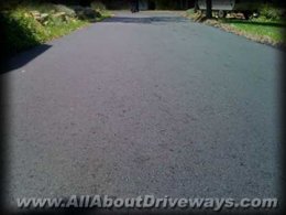 a closeup of an asphalt driveway installed by an allaboutdriveways.com trusted contractor user