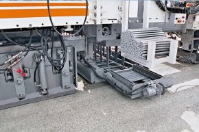 Automatically inserted dowel bars transfer lots from one cement slab to another