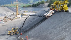 Milling from the high pitch of a water reservoir.