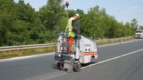 Removing road markings.