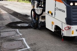 The manhole cover is milled around neatly and rapidly in one pass.