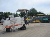 Asphalt milling machines